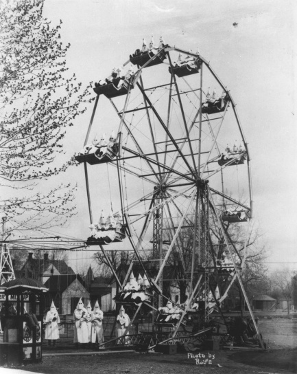 KKK members riding a ferris wheel
