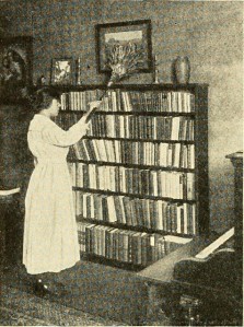 Woman dusting bookshelves